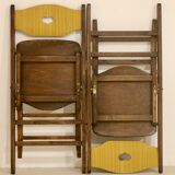 Pair of vintage folding chairs year 50 sculpted backrest.