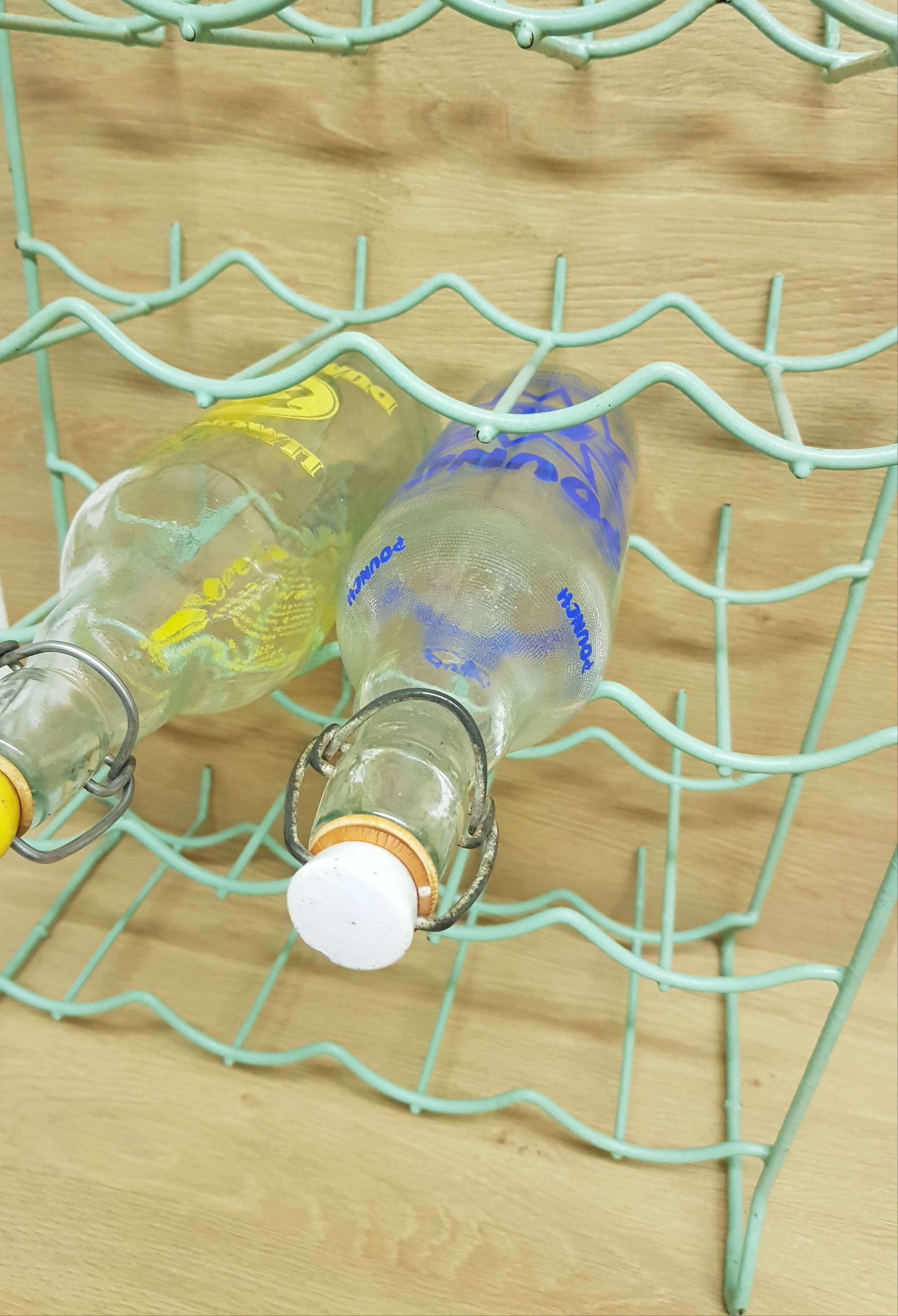 Metal aqua green bottle rack