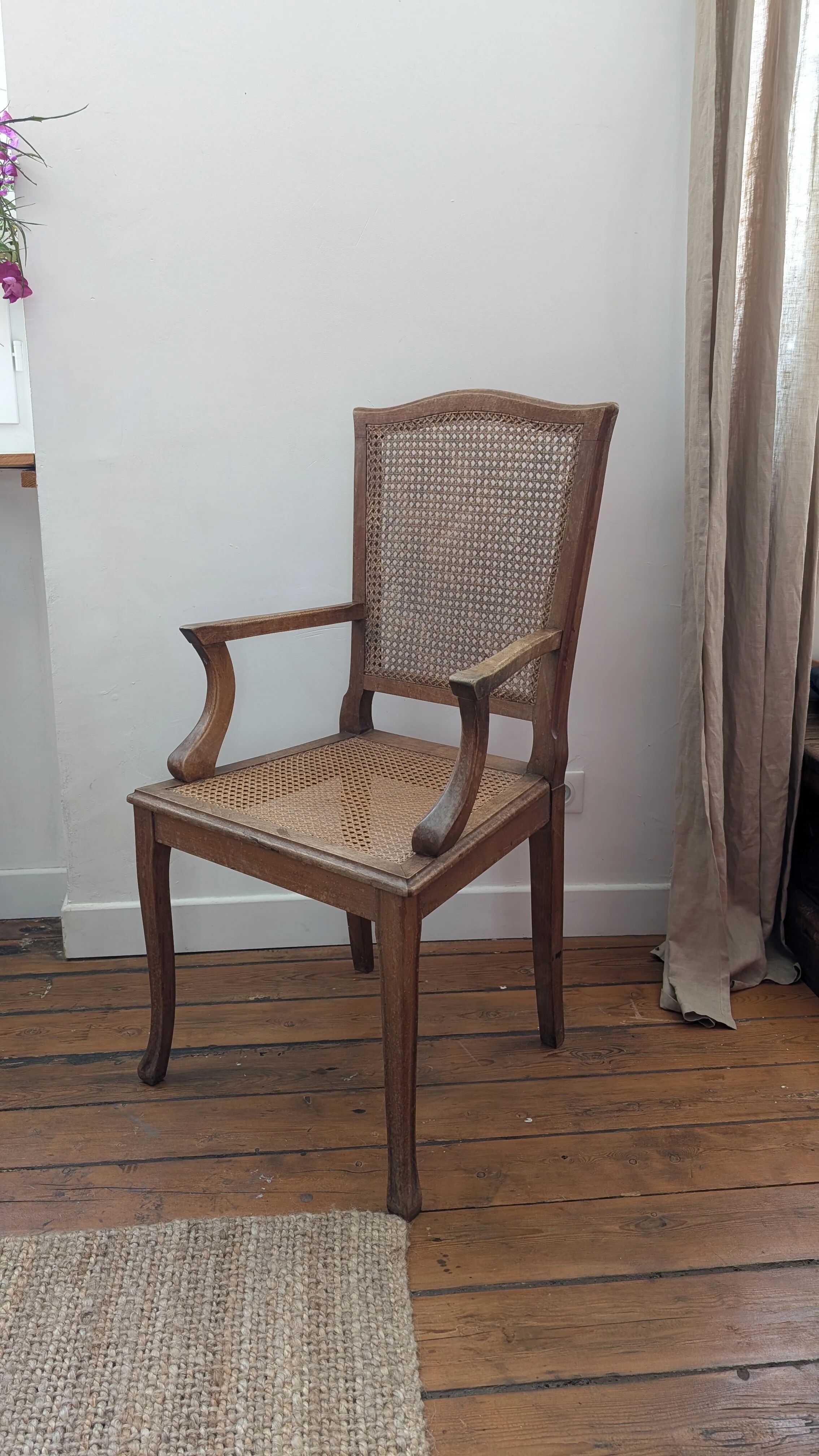Antique Louis XVI style armchair in wood and caning