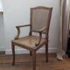 Fauteuil ancien de style Louis XVI en bois et cannage