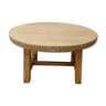 Round coffee table in raw wood