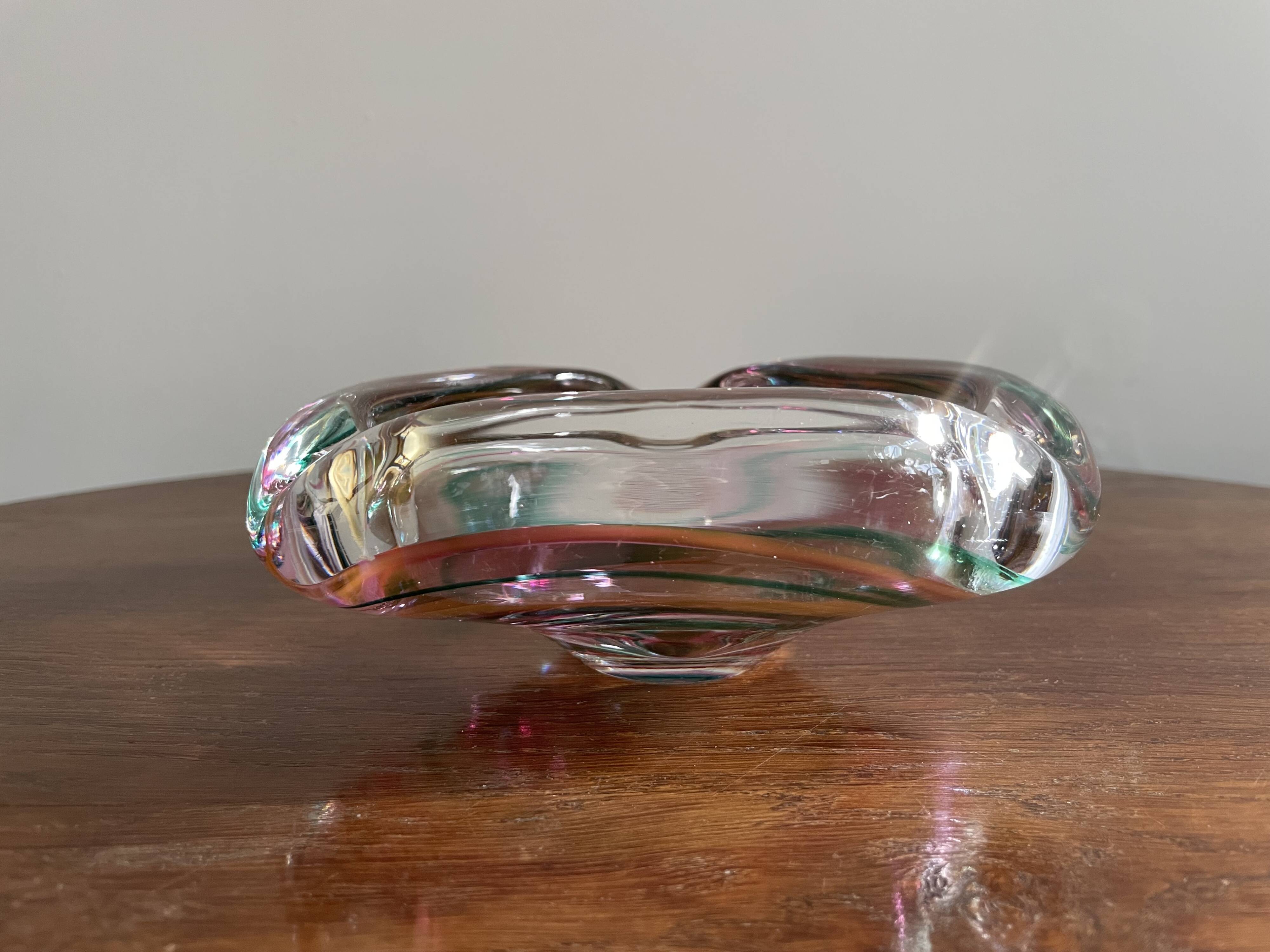 Clear with a soft coloured swirl pattern, round, glass ashtray
