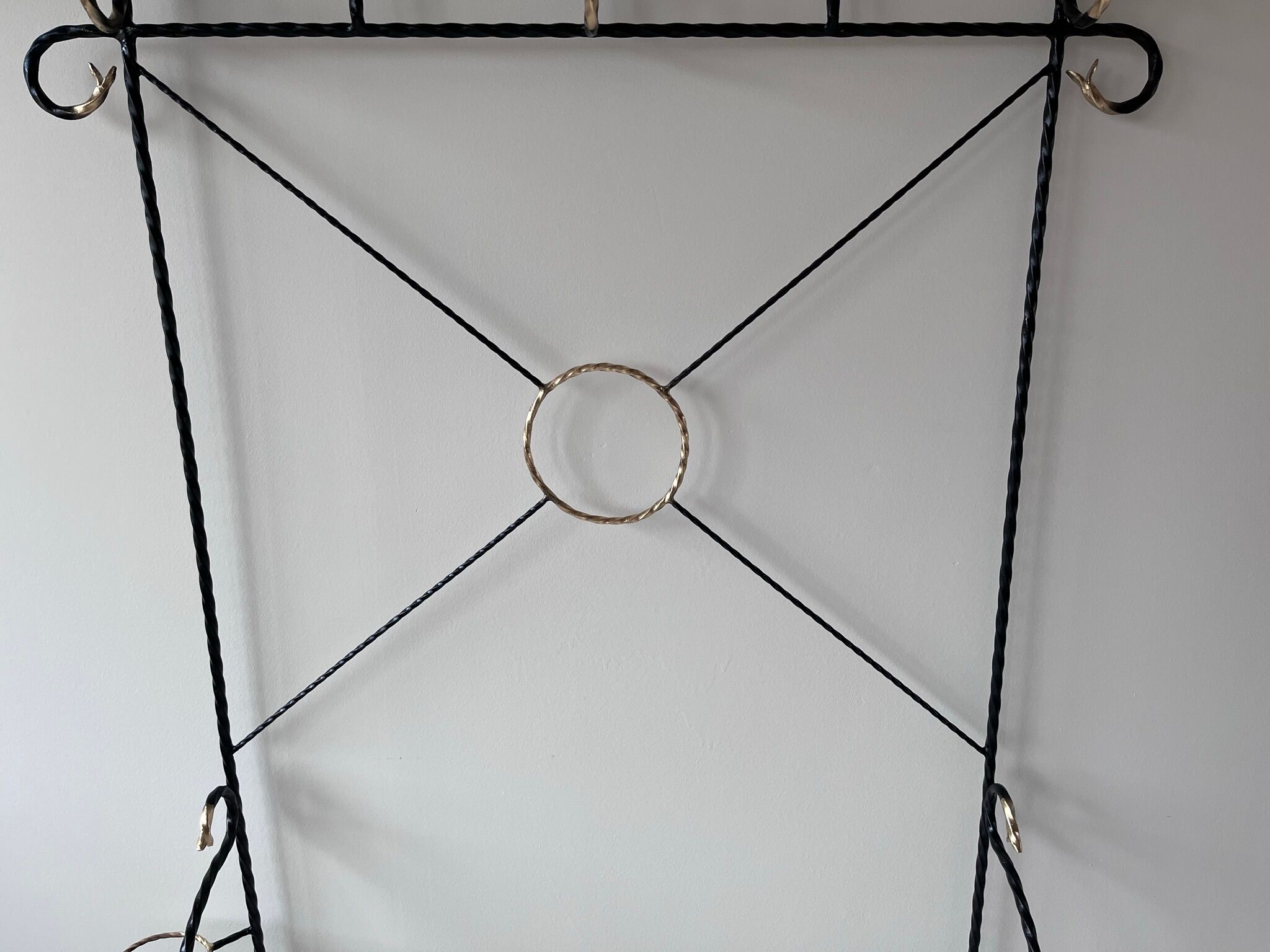 Wrought iron coat rack
