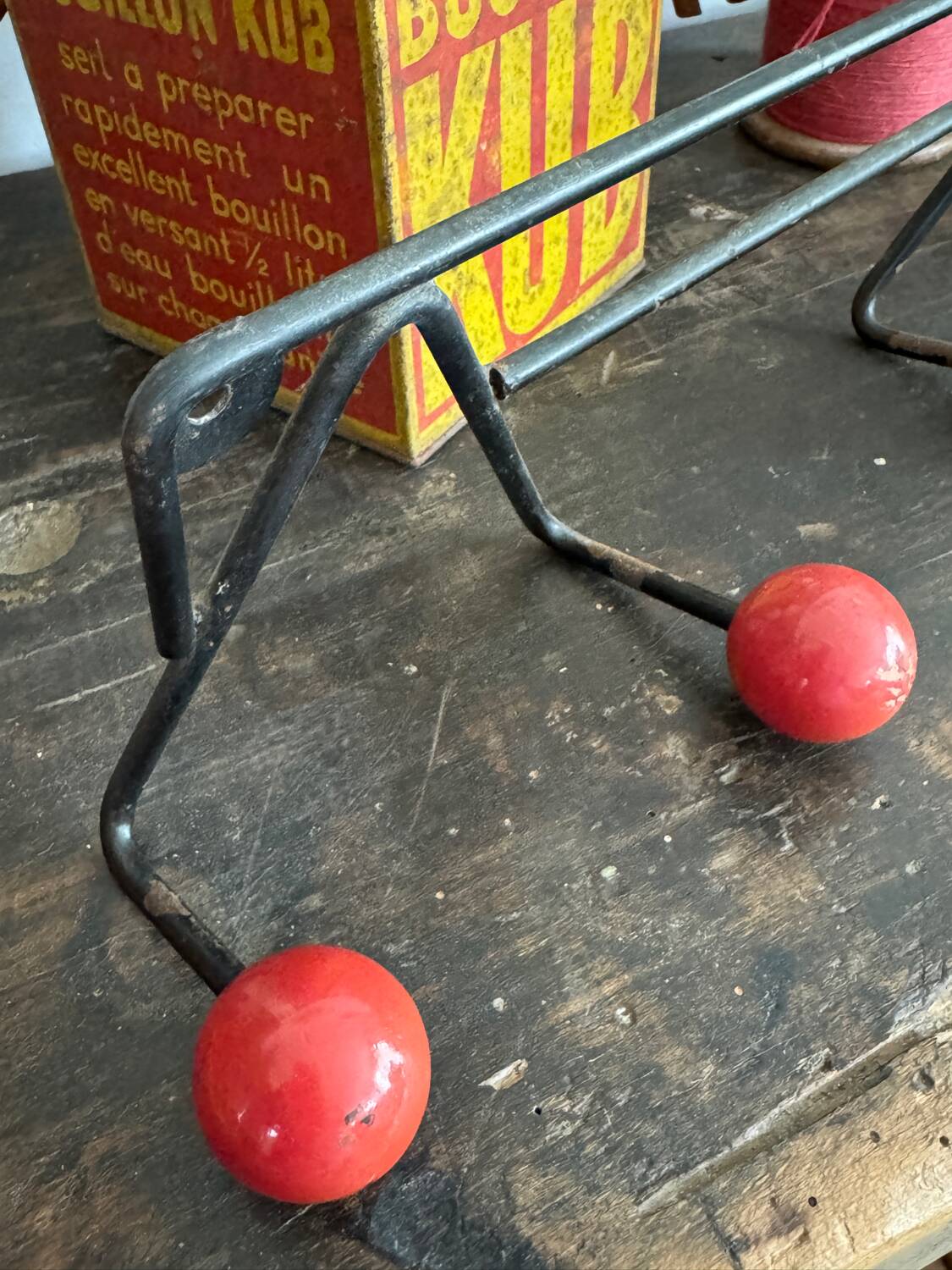 Wall coat rack with vintage red balls