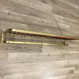 Coat rack with scoubidou shelf