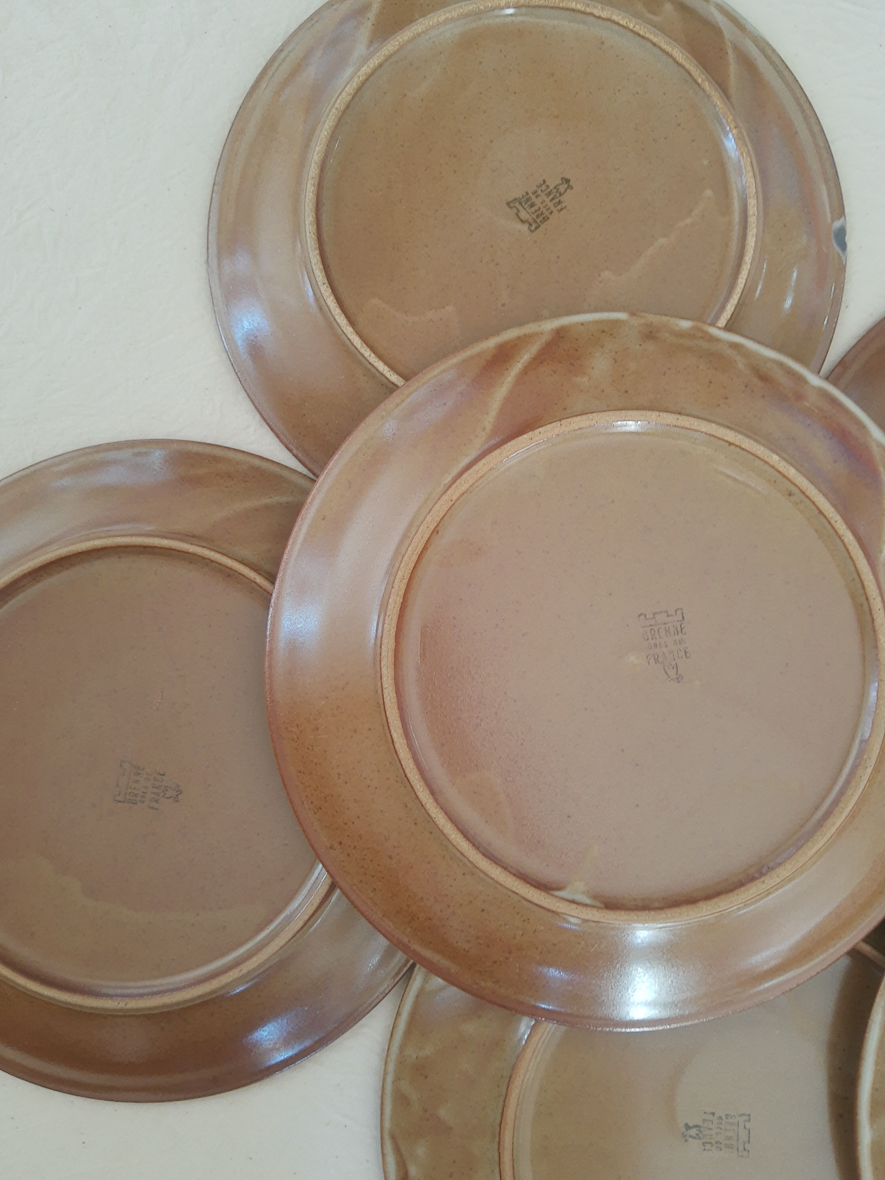 Set of 8 vintage brenne stoneware flat plates