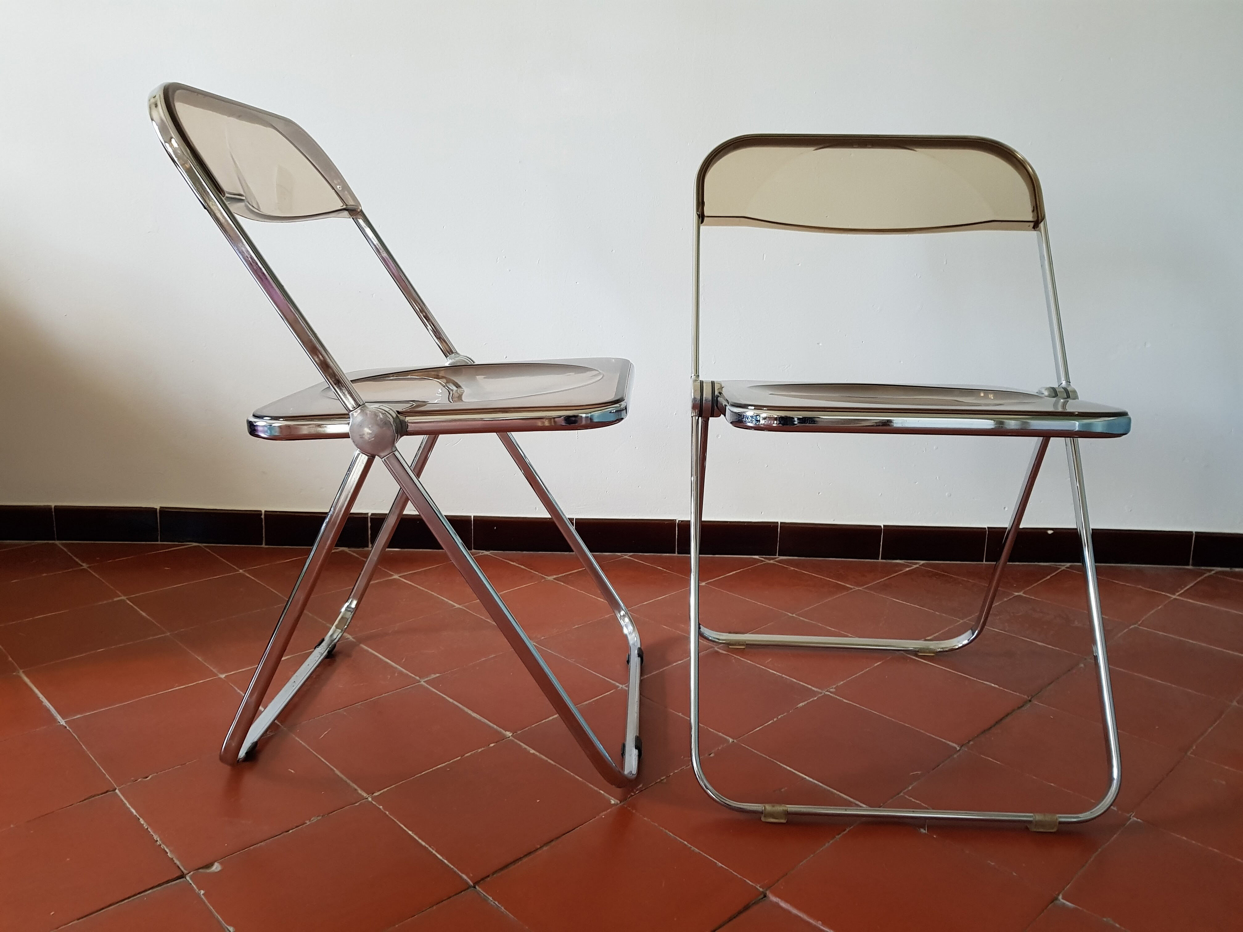 Trio of chairs folded Castelli design Giancarlo company
