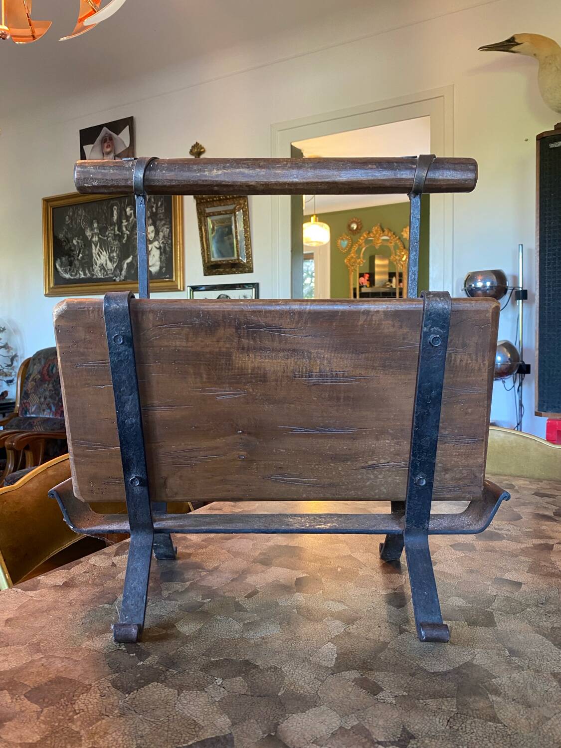 Vintage brutalist magazine rack.