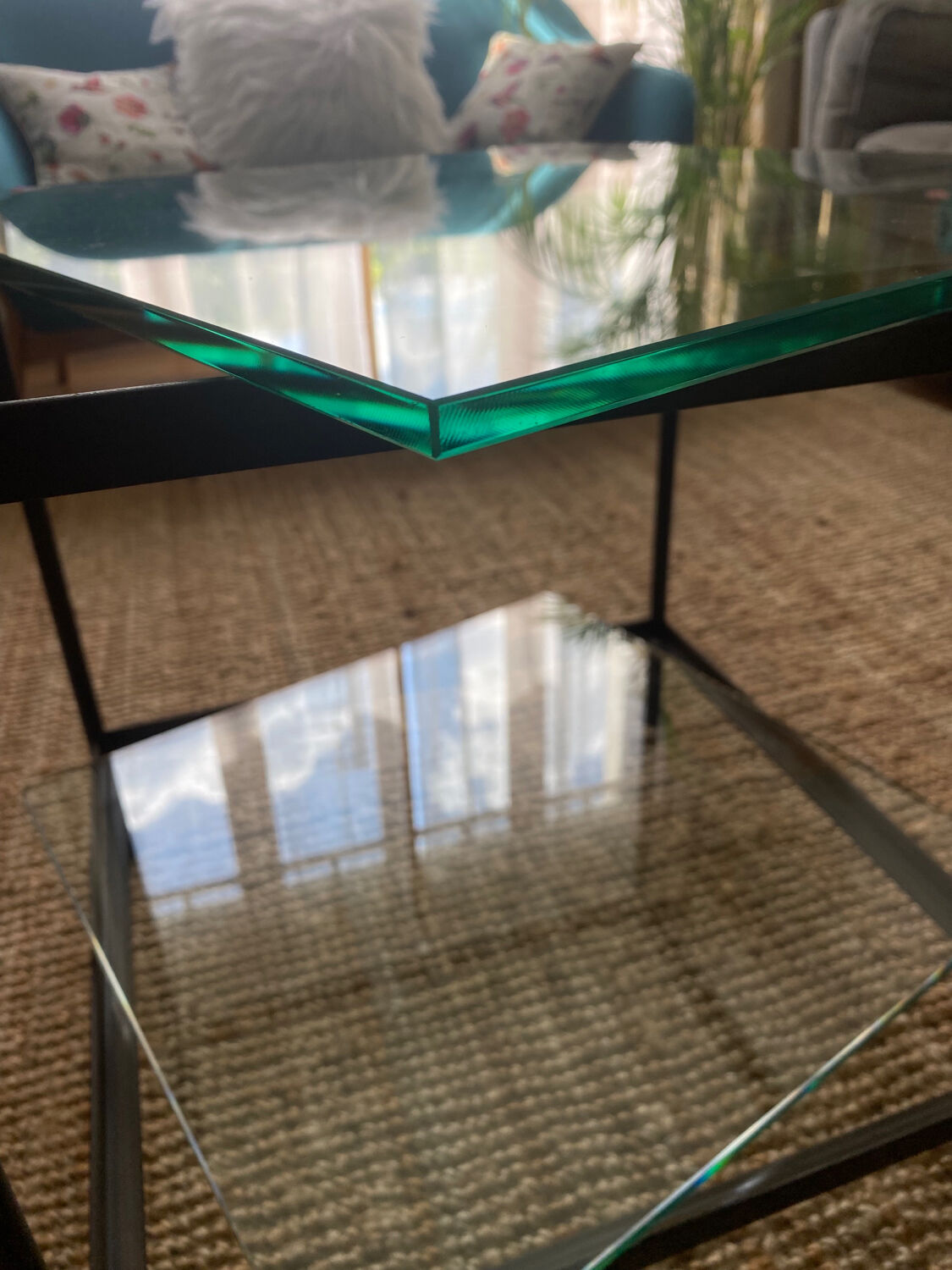 Glass and wrought iron coffee table design