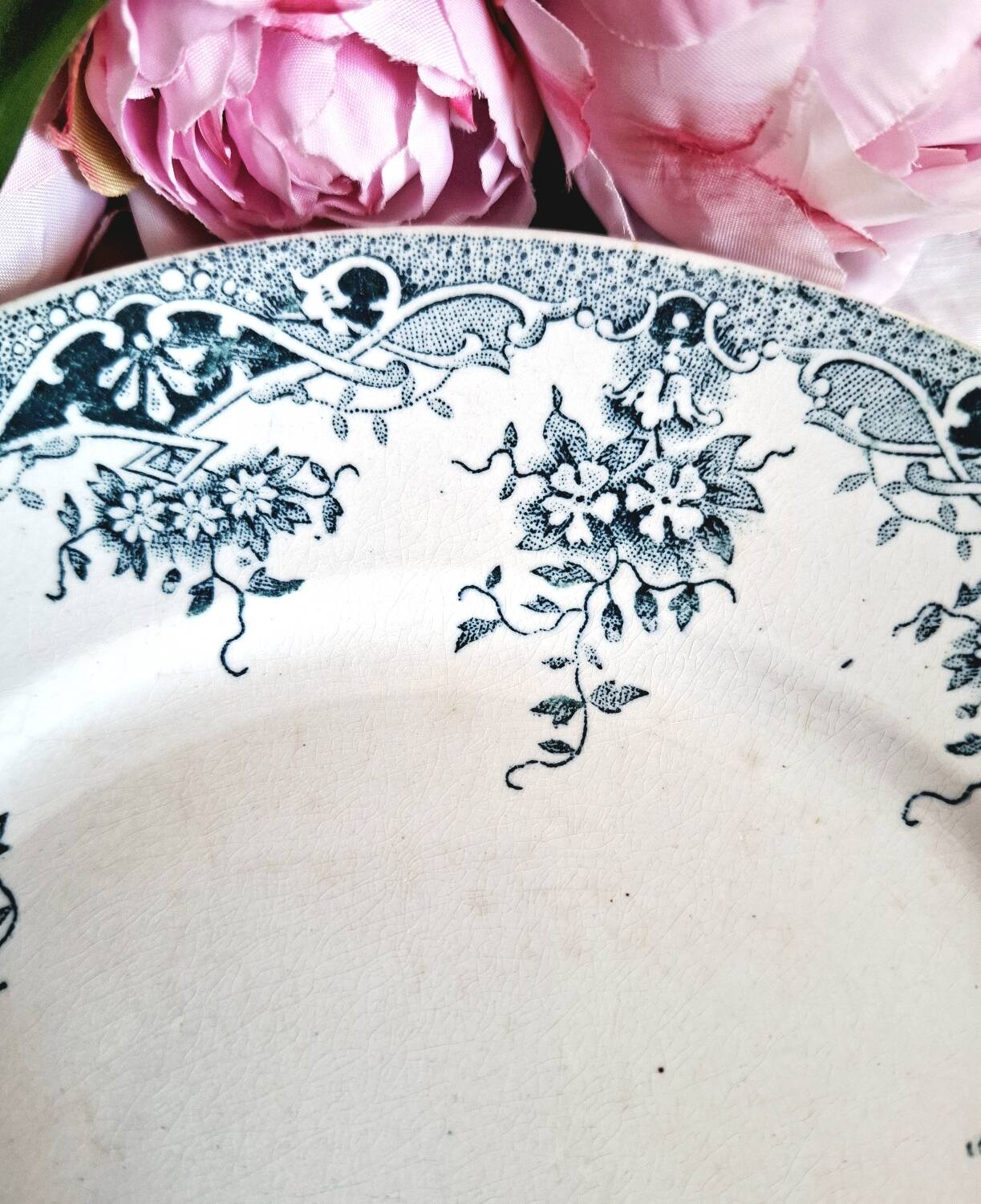 Antique earthenware dessert plates accompanied by a dish