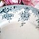 Antique earthenware dessert plates accompanied by a dish