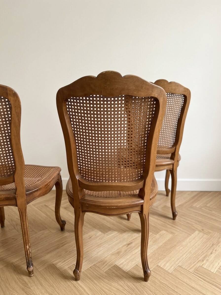 Set of 4 Regency chairs in caned cherry wood.