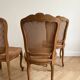 Set of 4 Regency chairs in caned cherry wood.