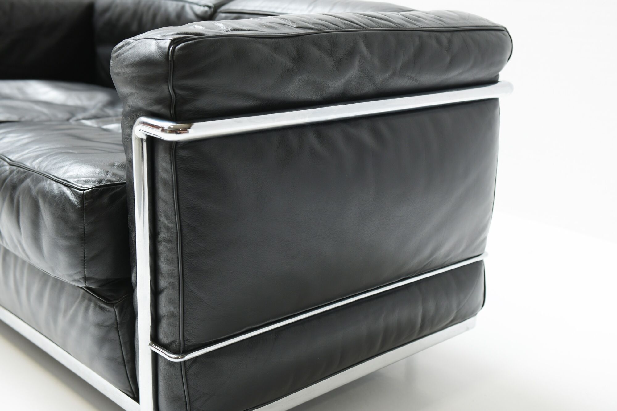 Vintage LC-2 in black leather by Le Corbusier, Jeanneret & Perriand for Cassina
