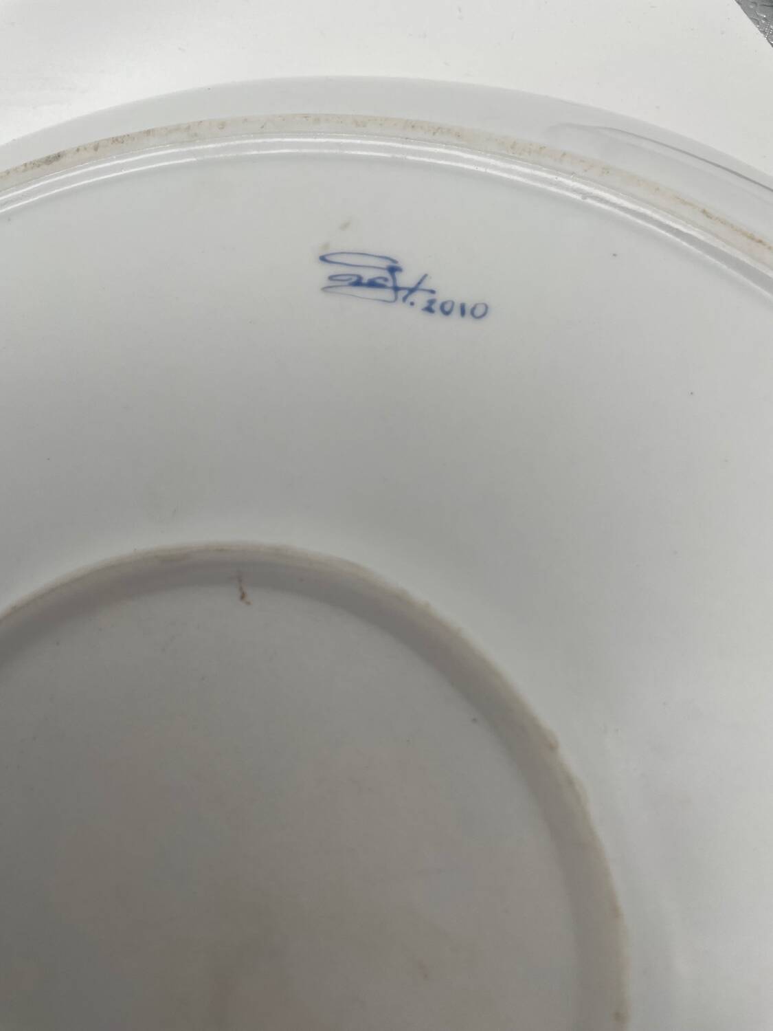 Hand painted porcelain plate with landscape decoration