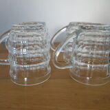 4 transparent glass mugs