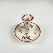 Hand-painted ceramic candlestick, flower pattern.
