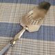 Art Deco brass pie server