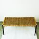 Black steel and wicker side table by Carl Auböck, mid-century.