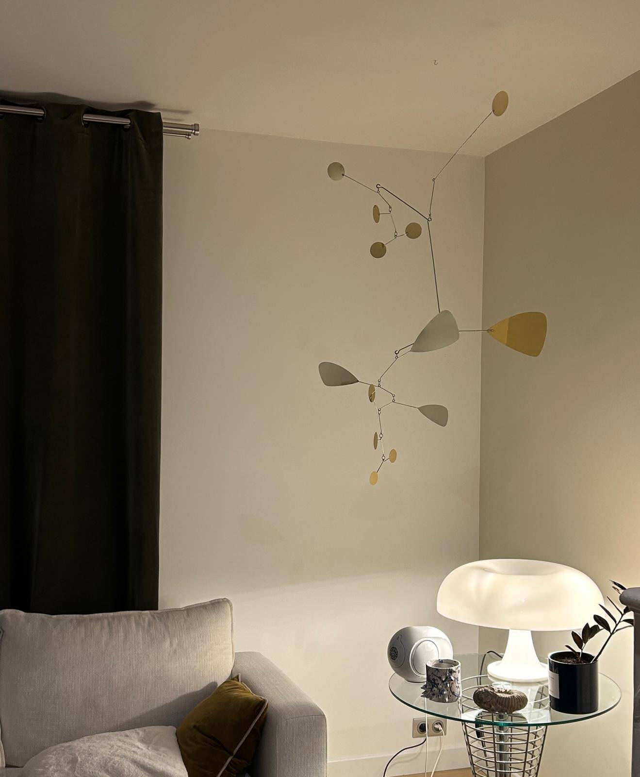 Very large mobile brass sculpture