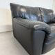 Two-seater black leather sofa — postmodern design
