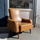 Vintage armchair imitation brown leather