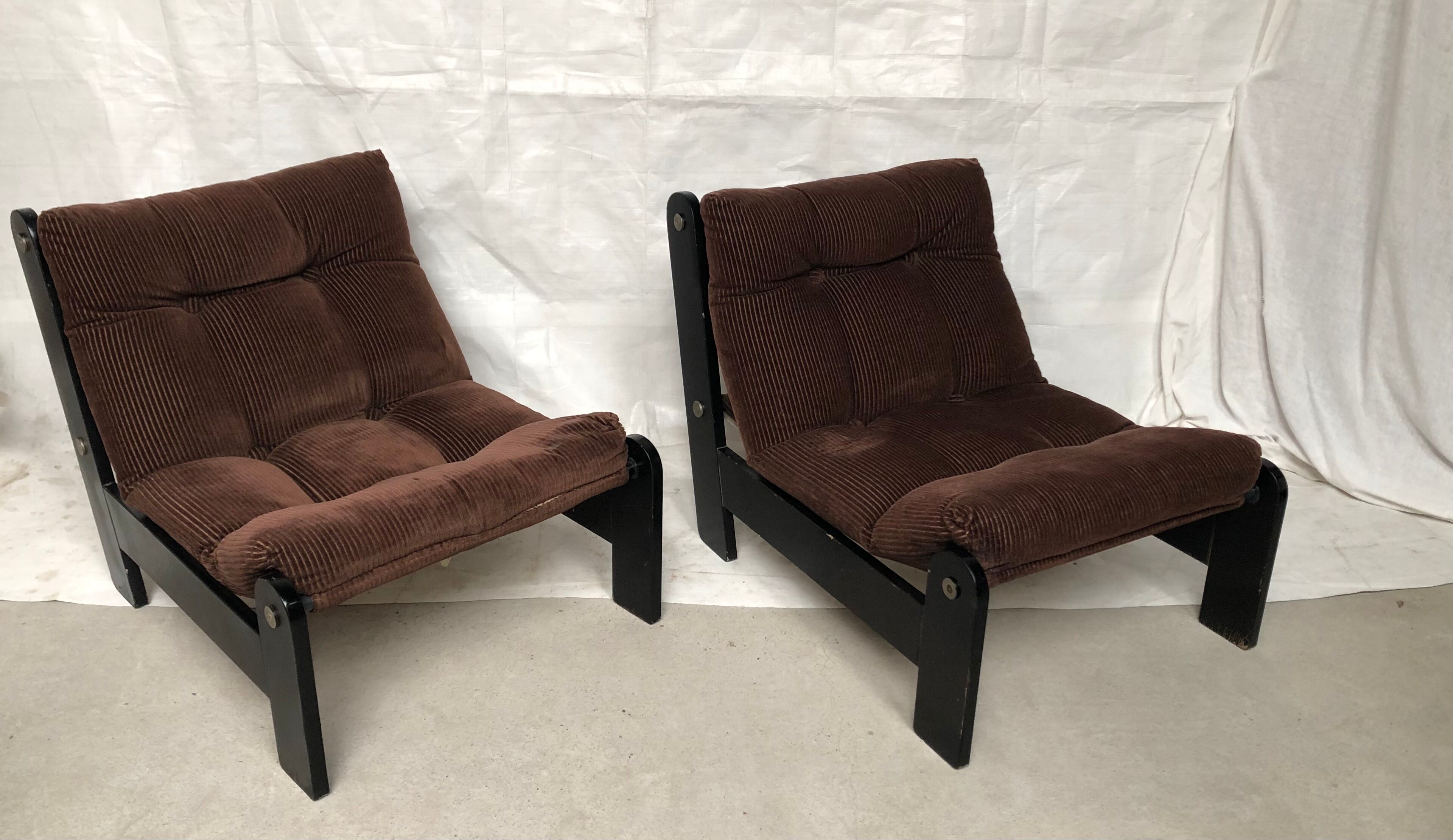 Modernist armchairs wood heaters and brown velvet vintage 70s