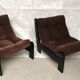 Modernist armchairs wood heaters and brown velvet vintage 70s
