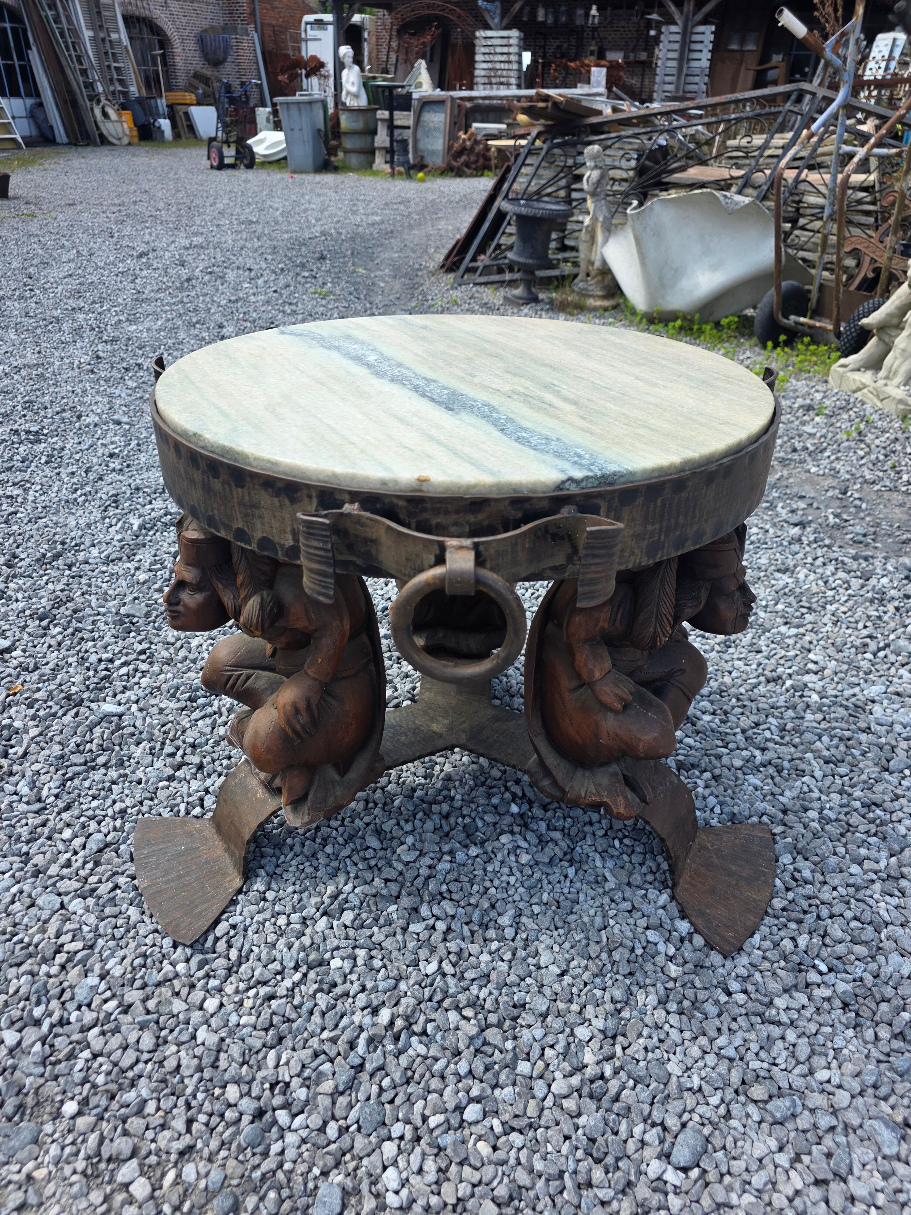 Wrought iron and marble coffee table, Jean Maurice Rothschild, circa 1950.