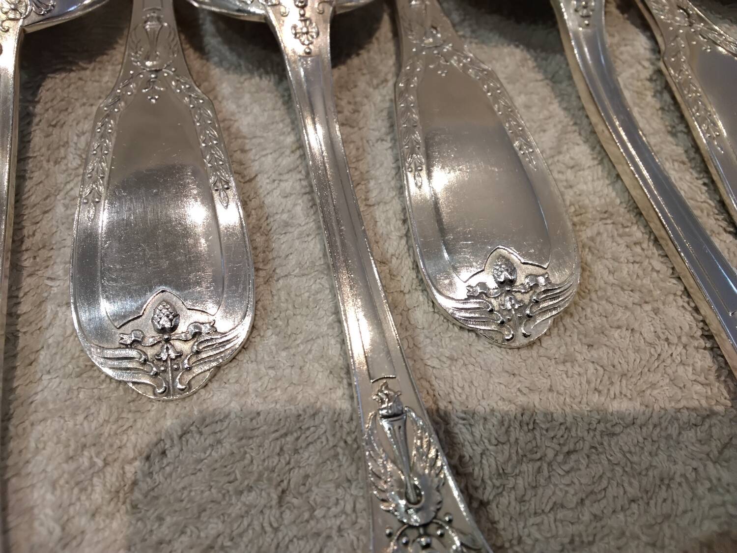 12 silver-plated metal soup spoons by Ravinet & Cie, Empire 81.