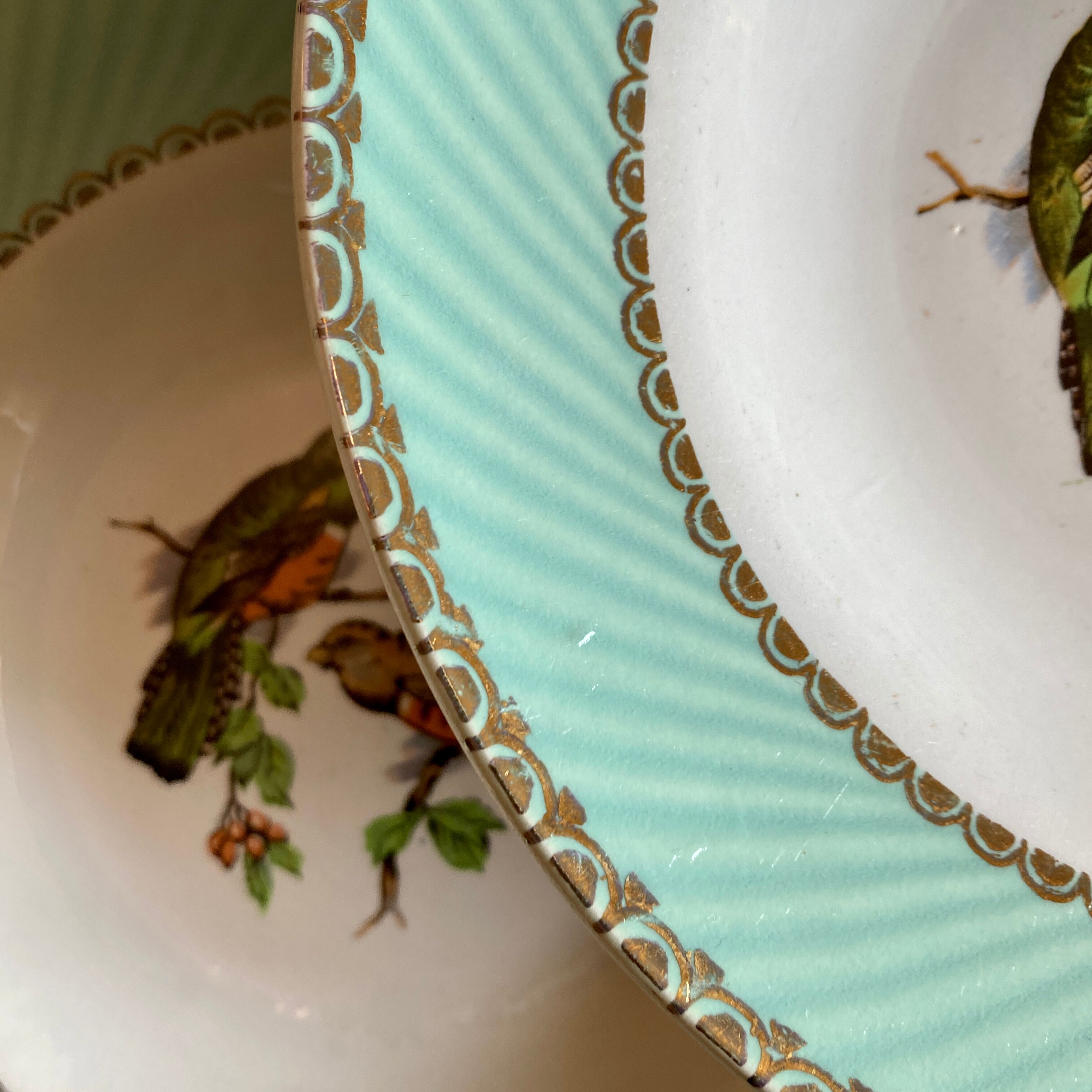 Set of 8 hollow plates vinatge with bird decorations