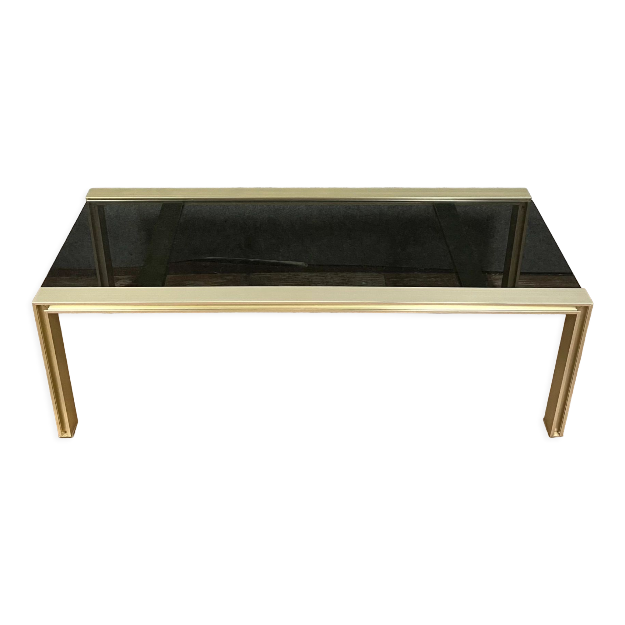 Table basse design en métal doré et verre teinté