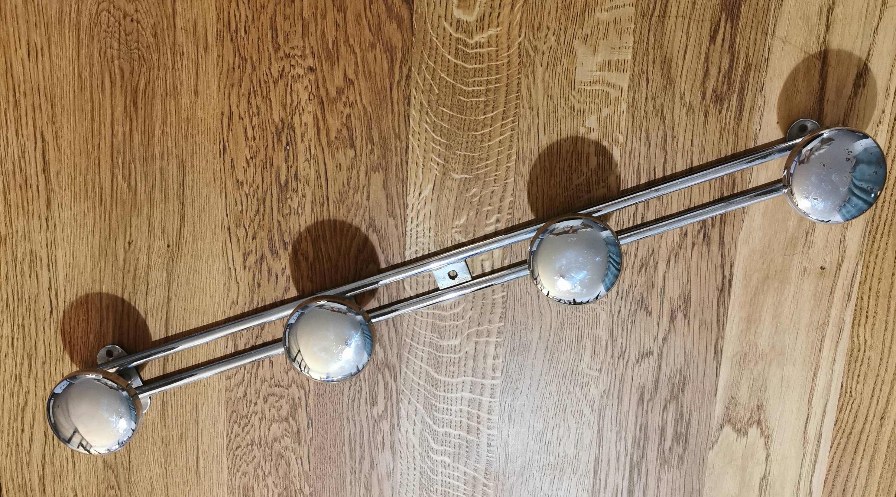 Vintage wall-mounted coat rack with 4 hooks