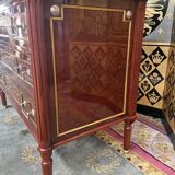 Louis XVI style chest of drawers in mahogany and amaranth