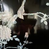 Black lacquered artisanal bar with mother-of-pearl inlays.