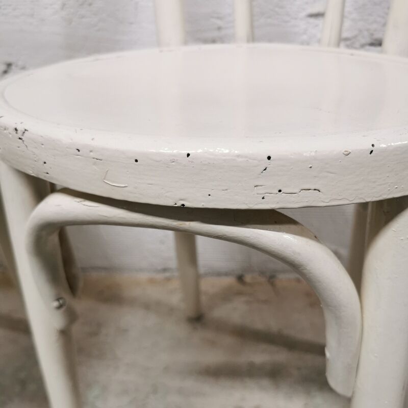 Pair of white Baumann bistro chairs