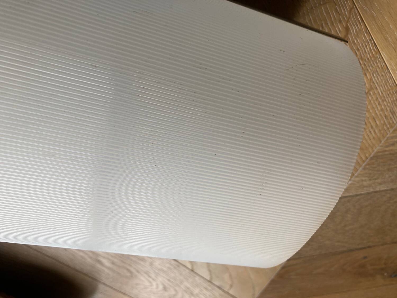 Brushed metal and ribbed opal plastic wall lights