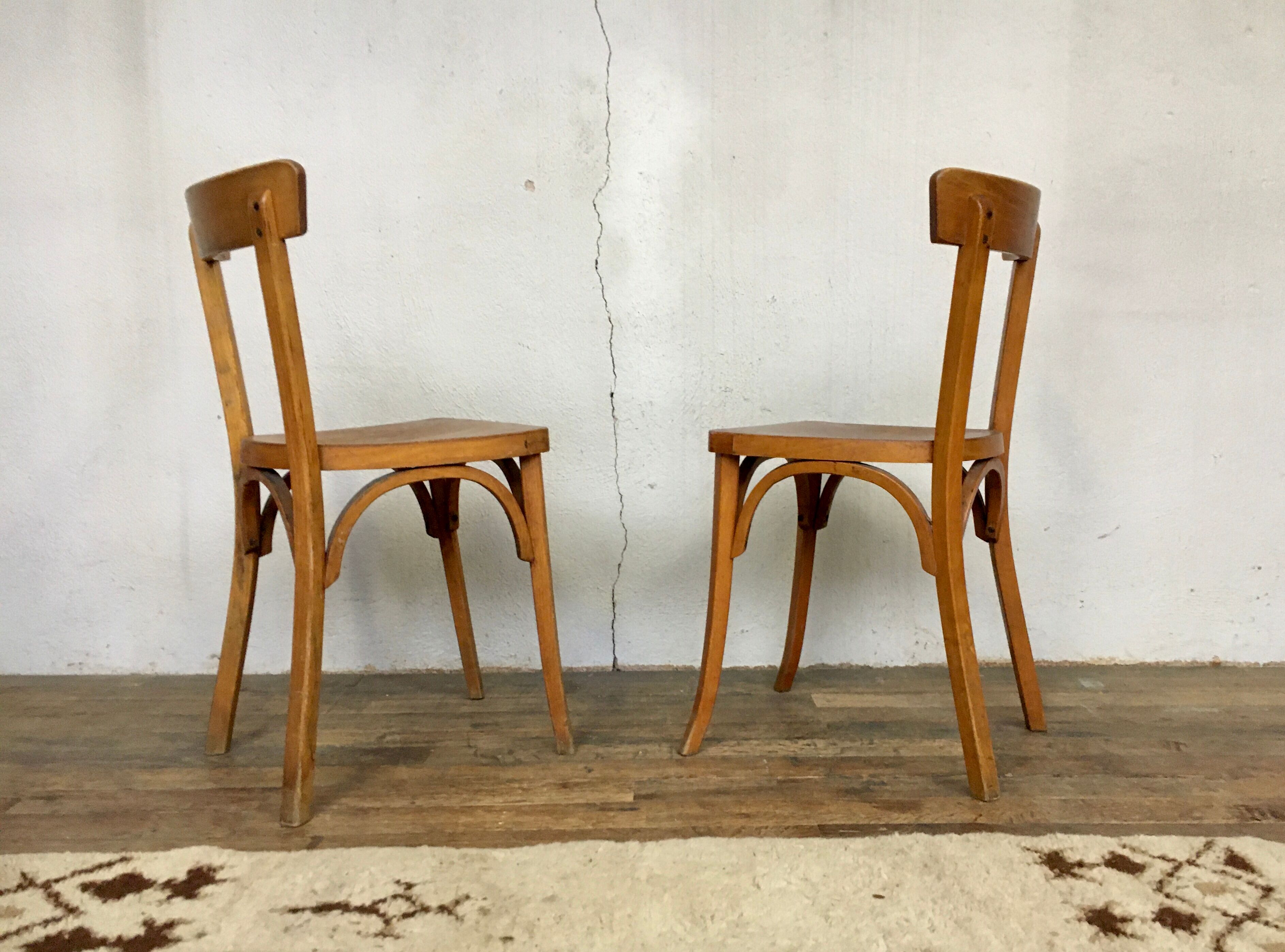 Pair of vintage clear beech baumann chair