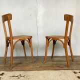 Pair of vintage clear beech baumann chair