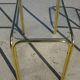 Nested table in gold metal and glass