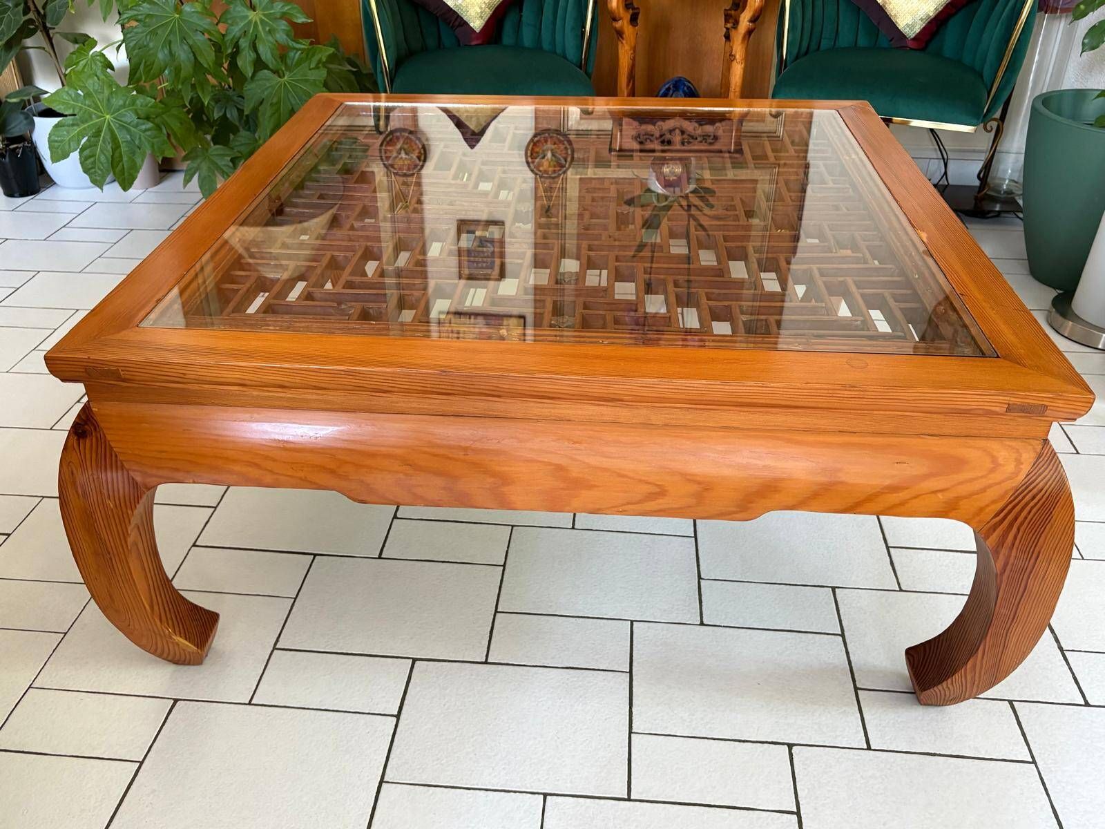Large Chinese/Asian coffee table in wood – latticework decoration under varnish.
