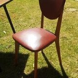 Paire de chaises type Baumann skaï 1960 pieds compas