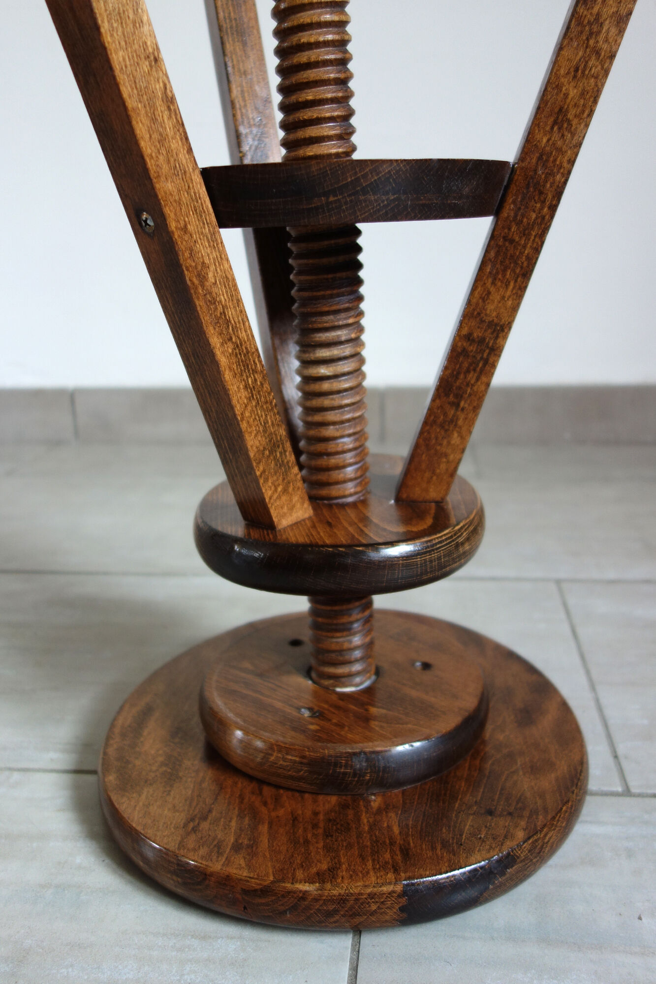 Old tripod wood screw stool