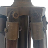 Classic lampshade on antique surveyor tripod