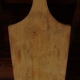 Wood cutting board with groove and handle