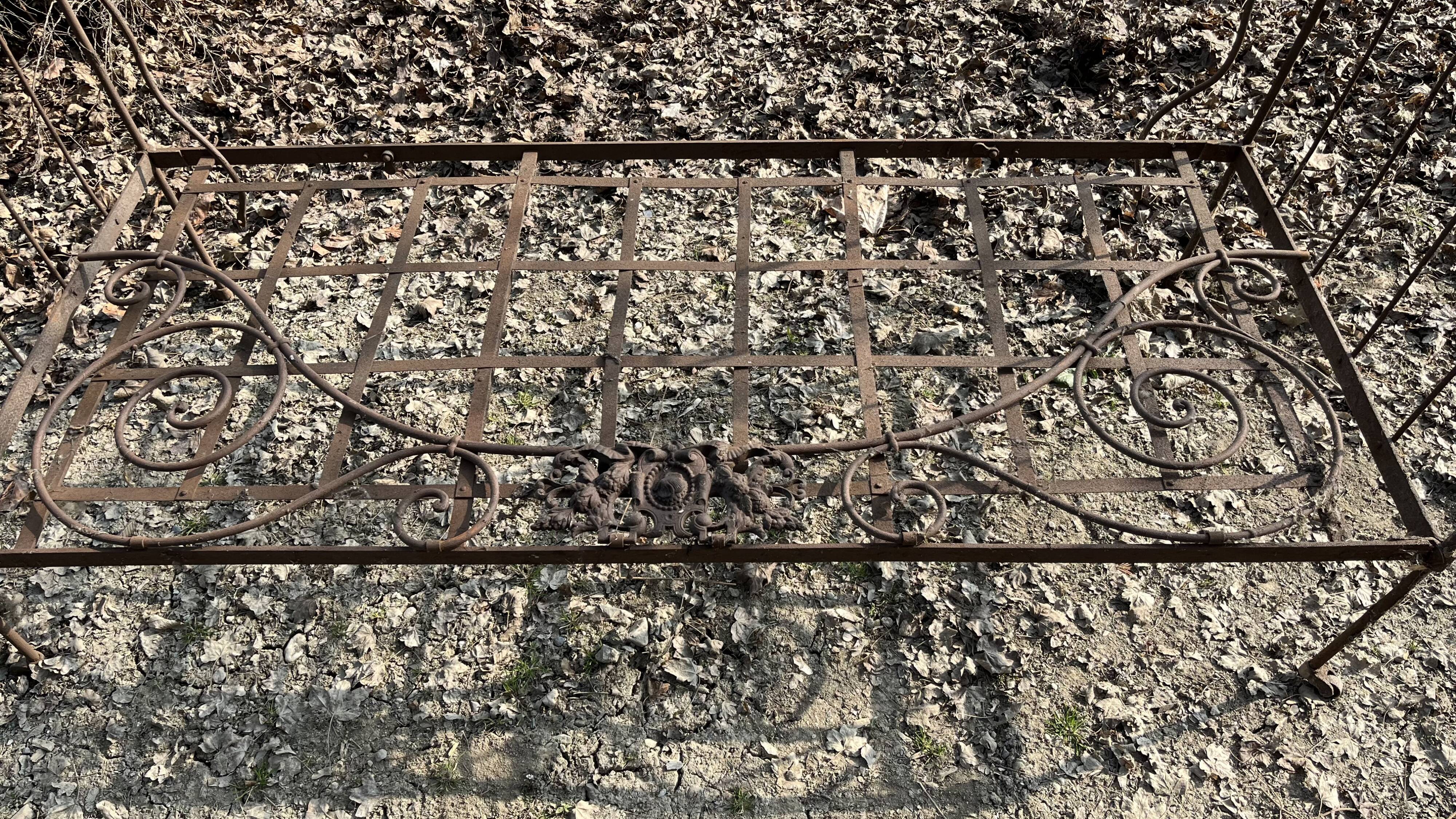 Folding wrought iron bed 1900