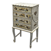 Vintage commode refurbished with 4 drawers in classic style with floral decor.