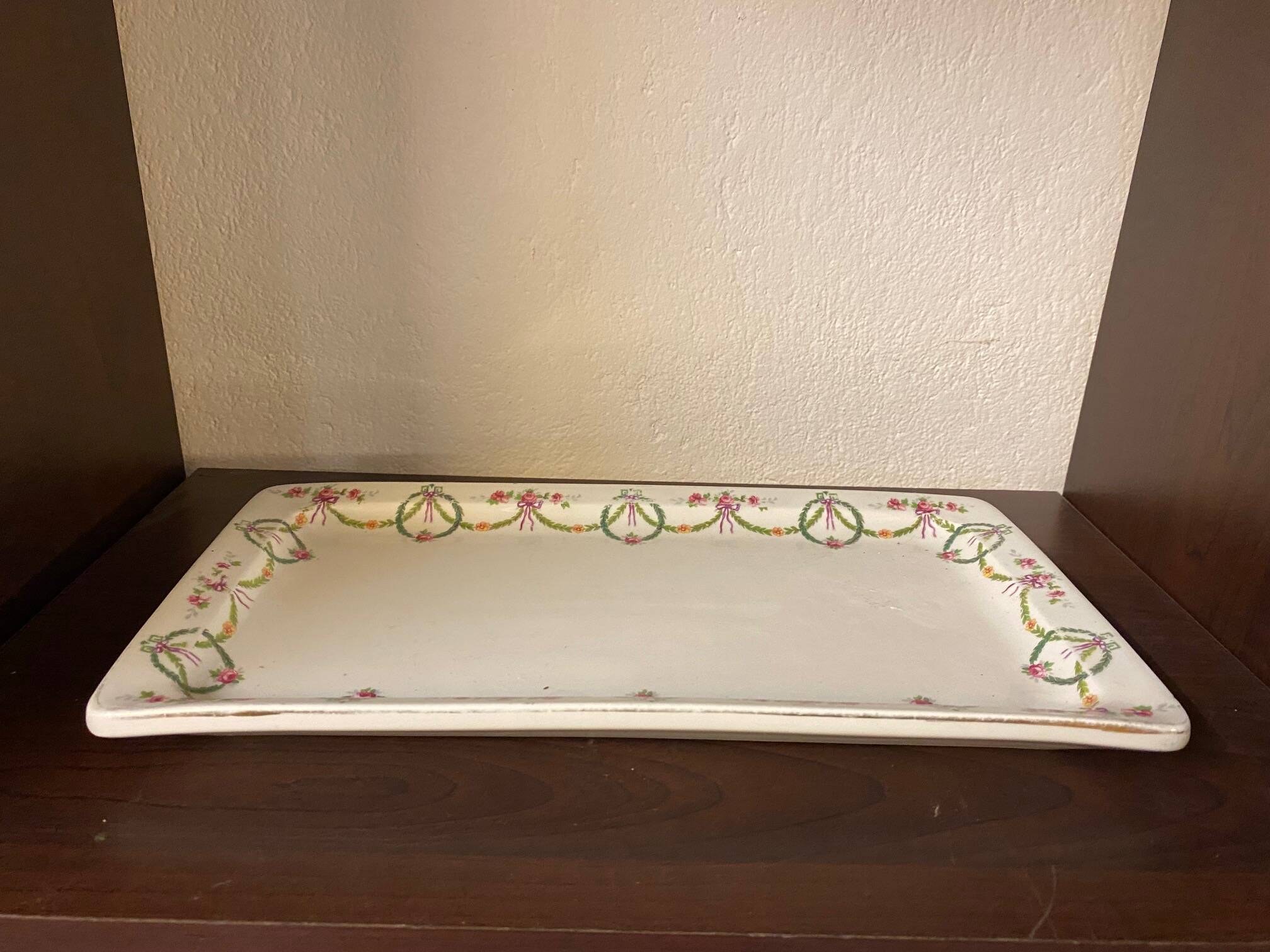 Mehun france earthenware cake dish with empire style floral frieze