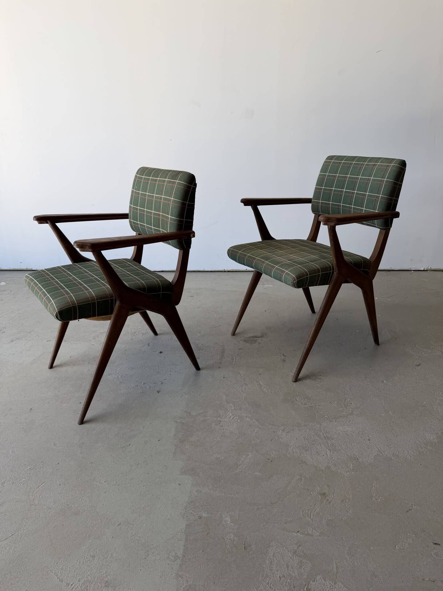 Pair of armchairs with a Scandinavian design in vintage teak from the 1960s.