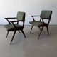 Pair of armchairs with a Scandinavian design in vintage teak from the 1960s.